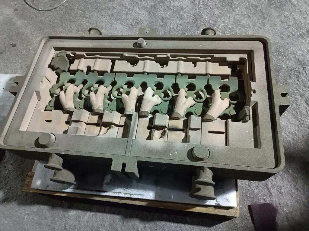 3D printed sand core for a cylinder head casting